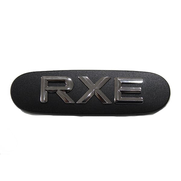 Emblema insignia "rxe" moldura puerta orig megane